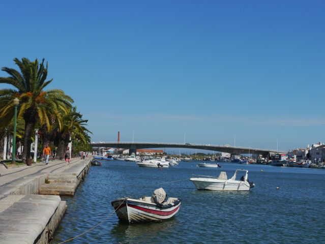 BOATS ON RIVER IN TAVIRA ALGARVE PORTUGAL